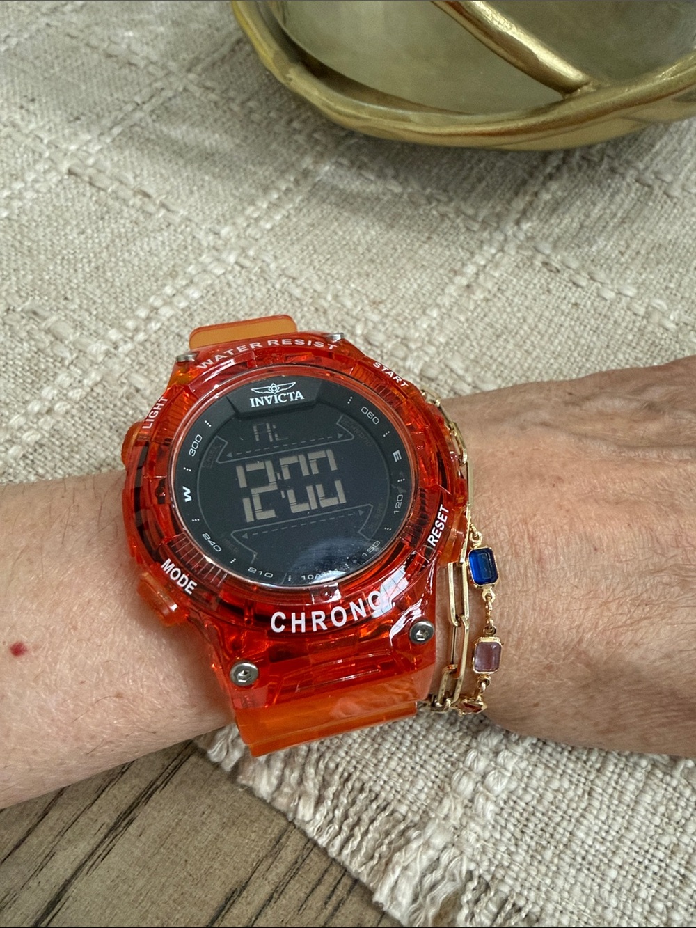 Invicta translucent orange digital chronograph watch